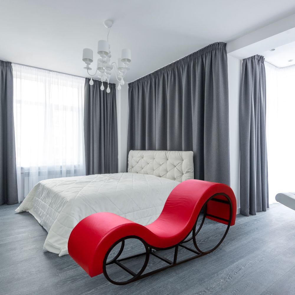 Hot Red Tantra Couch  with Sleek Black Metal Frame – Sculpted Curve Sofa with Enhanced Support | Luvottica